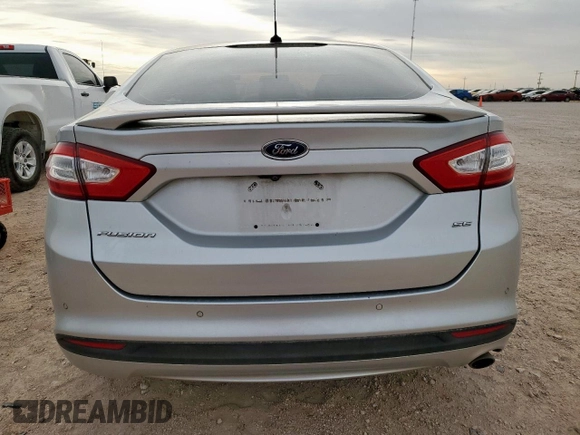 2016 Ford Fusion SE z VIN 3FA6P0H76GR354810, wystawiony jako Copart lot #55874245 z przebiegiem 158 010 mil mil oraz Szkoda całkowita • Salvage title. Historia ofert i sprzedaży dostępna na DreamBid. Obrazek 6.