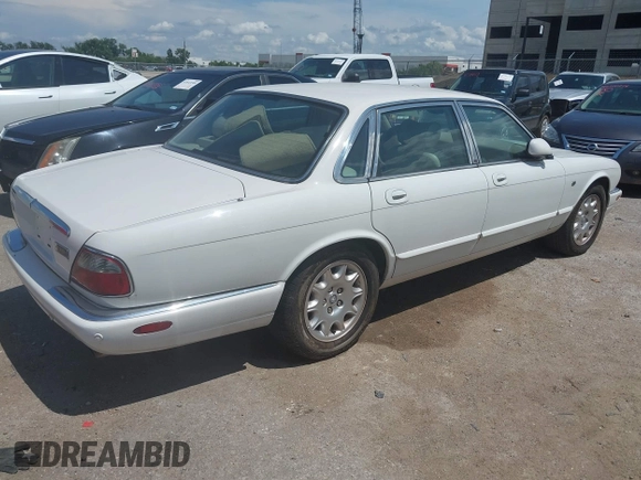 2003 Jaguar XJ 8 with VIN SAJDA14C03LF52338, listed as a IAAI auction lot 42684038 with 142,107 mi miles and . Bid and sale history available at DreamBid. Image 4.
