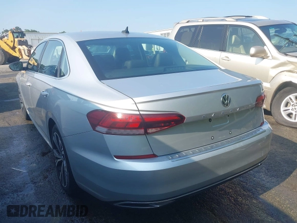 2021 Volkswagen Passat SE with VIN 1VWSA7A38MC012907, listed as a IAAI auction lot 42581889 with 76,001 mi miles and . Bid and sale history available at DreamBid. Image 3.