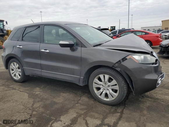2010 Acura RDX Tech Pkg with VIN 5J8TB2H52AA000565, listed as a Copart auction lot 43120135 with 135,203 mi miles and Salvage Title. Bid and sale history available at carsss.com. Image 4.
