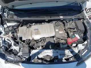 2021 Toyota Prius L Eco with VIN JTDKAMFU8M3133925, listed as a IAAI auction lot 41966660 with 115,193 mi miles. Bid and sale history available at carsss.com. Image 10.