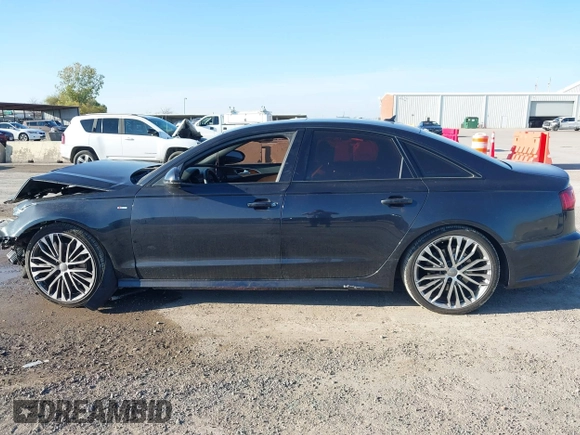 2016 Audi A6 2.0T Premium with VIN WAUFFAFC5GN199203, listed as a IAAI auction lot 41150658 with 181,176 mi miles. Bid and sale history available at carsss.com. Image 14.