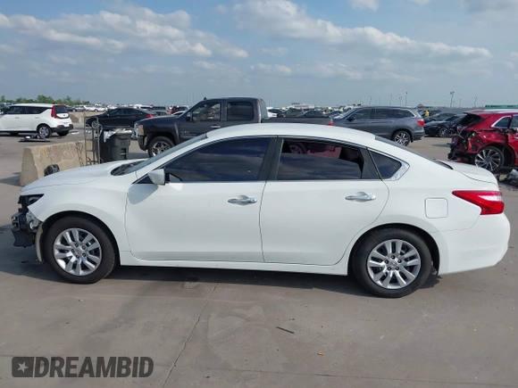 2016 Nissan Altima S with VIN 1N4AL3AP5GN310804, listed as a IAAI auction lot 42044974 with 140,021 mi miles and . Bid and sale history available at carsss.com. Image 15.