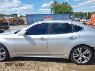 2013 Infiniti M with VIN JN1BY1AP0DM513527, listed as a IAAI auction lot 42170513 with 194,908 mi miles and . Bid and sale history available at DreamBid. Image 15.