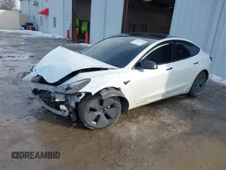 2021 Tesla Model 3 Long Range with VIN 5YJ3E1EB6MF094309, listed as a IAAI auction lot 41651475 with Not Provided miles. Bid and sale history available at carsss.com. Image 16.