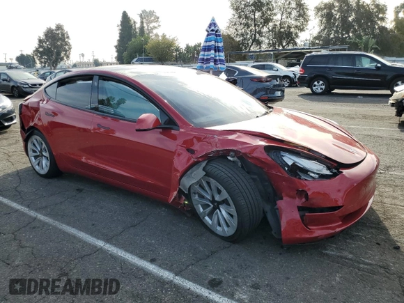 2023 Tesla Model 3 with VIN 5YJ3E1EA5PF548786, listed as a Copart auction lot 82928324 with Not Provided miles and Salvage Title. Bid and sale history available at DreamBid. Image 4.