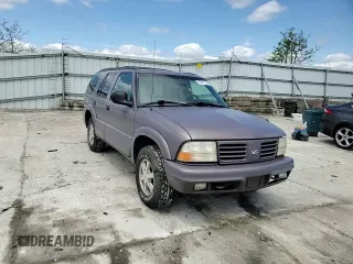 1998 Oldsmobile Bravada z VIN 1GHDT13W9W2718457, wystawiony jako Copart lot #55341755 z przebiegiem 133 968 mil mil oraz Tytuł czysty. Historia ofert i sprzedaży dostępna na DreamBid. Obrazek 15.