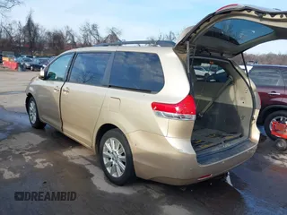 2014 Toyota Sienna Ltd with VIN 5TDDK3DC0ES091759, listed as a IAAI auction lot 41150493 with 155,165 mi miles. Bid and sale history available at carsss.com. Image 3.