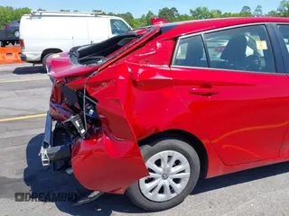 2022 Toyota Prius L Eco with VIN JTDKAMFU6N3158307, listed as a IAAI auction lot 42042768 with 17,882 mi miles and . Bid and sale history available at DreamBid. Image 18.