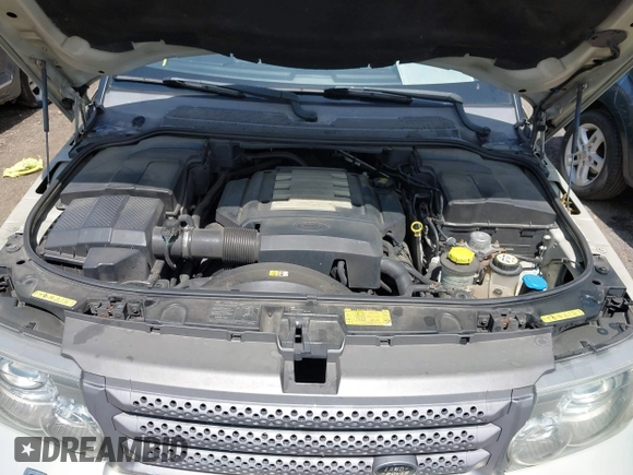 2006 Land Rover Range Rover Sport HSE z VIN SALSF25436A970841, wystawiony jako IAAI lot #42152175 z przebiegiem 254 024 mil mil oraz . Historia ofert i sprzedaży dostępna na DreamBid. Obrazek 10.