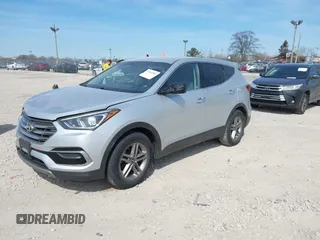 2017 Hyundai Santa Fe 2.4L z VIN 5XYZTDLB8HG465425, wystawiony jako IAAI lot #42041881 z przebiegiem 103 161 mil mil oraz . Historia ofert i sprzedaży dostępna na DreamBid. Obrazek 2.