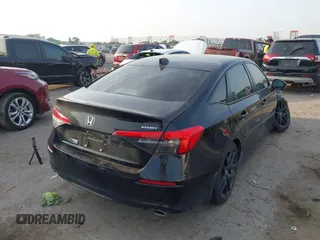 2023 Honda Civic Sport z VIN 2HGFE2F51PH503134, wystawiony jako IAAI lot #42264812 z przebiegiem 13 582 mil mil oraz . Historia ofert i sprzedaży dostępna na DreamBid. Obrazek 4.