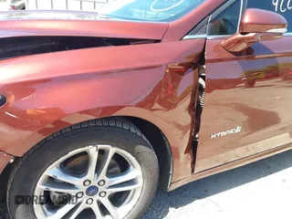 2016 Ford Fusion SE Hybrid with VIN 3FA6P0LU3GR143688, listed as a IAAI auction lot 42269789 with 163,910 mi miles and . Bid and sale history available at DreamBid. Image 17.