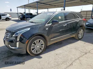 2018 Cadillac XT5 Premium Luxury AWD z VIN 1GYKNFRS6JZ116893, wystawiony jako Copart lot #61195275 z przebiegiem 150 618 mil mil oraz Szkoda całkowita • Salvage title. Historia ofert i sprzedaży dostępna na DreamBid. Obrazek 1.