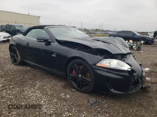 2011 Jaguar XK with VIN SAJWA4EC7BMB42394, listed as a Copart auction lot 83760564 with 67,316 mi miles and Salvage Title. Bid and sale history available at carsss.com. Image 4.