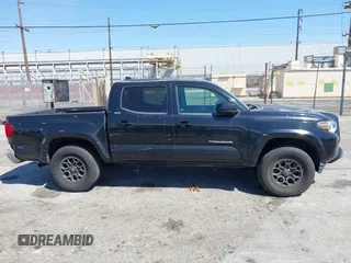 2018 Toyota Tacoma SR5 with VIN 3TMAZ5CN1JM061127, listed as a IAAI auction lot 42012247 with 119,381 mi miles and . Bid and sale history available at DreamBid. Image 13.