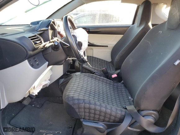 2012 Scion iQ with VIN JTNJJXB02CJ013978, listed as a Copart auction lot 81153534 with 85,050 mi miles and Salvage Title. Bid and sale history available at carsss.com. Image 7.