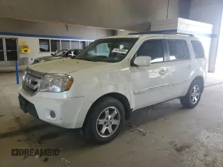 2011 Honda Pilot Touring z VIN 5FNYF3H91BB035074, wystawiony jako Copart lot #54789885 z przebiegiem 196 234 mil mil oraz Czysty tytuł • Clean title. Historia ofert i sprzedaży dostępna na DreamBid. Obrazek 1.