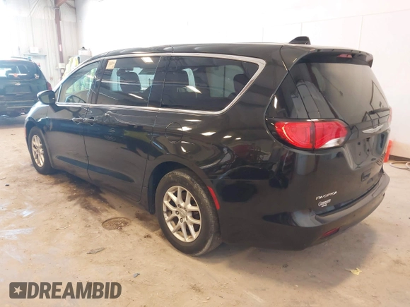 2017 Chrysler Pacifica Touring with VIN 2C4RC1DG3HR571477, listed as a IAAI auction lot 42040872 with 112,028 mi miles and . Bid and sale history available at DreamBid. Image 3.