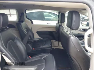2023 Chrysler Pacifica Hybrid Touring L with VIN 2C4RC1L70PR622000, listed as a IAAI auction lot 42711826 with 65,109 mi miles and . Bid and sale history available at DreamBid. Image 8.