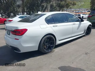 2017 BMW 7 Series 750i with VIN WBA7F0C32HGM22273, listed as a IAAI auction lot 41857151 with 90,518 mi miles and . Bid and sale history available at carsss.com. Image 4.