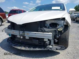 2013 Lincoln MKZ Hybrid with VIN 3LN6L2LU6DR807667, listed as a IAAI auction lot 42533419 with 90,327 mi miles and . Bid and sale history available at DreamBid. Image 13.