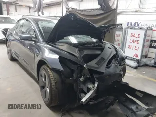 2023 Tesla Model 3 with VIN 5YJ3E1EAXPF669538, listed as a IAAI auction lot 40329679 with 16,612 mi miles and . Bid and sale history available at DreamBid. Image 1.