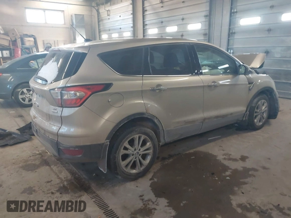2017 Ford Escape SE z VIN 1FMCU0GD0HUC93439, wystawiony jako IAAI lot #41447523 z przebiegiem 94 776 mil mil oraz . Historia ofert i sprzedaży dostępna na DreamBid. Obrazek 4.