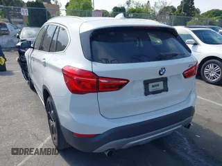 2018 BMW X1 xDrive28i with VIN WBXHT3C37J5K28375, listed as a IAAI auction lot 42039336 with 28,664 mi miles. Bid and sale history available at carsss.com. Image 3.