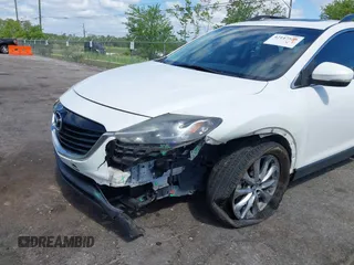 2014 Mazda CX-9 Grand Touring with VIN JM3TB2DA8E0436650, listed as a IAAI auction lot 42147525 with 124,179 mi miles and . Bid and sale history available at DreamBid. Image 6.