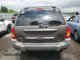 2000 Jeep Grand Cherokee Laredo с VIN 1J4G248S4YC299003, выставлен на аукционе Copart как лот 55937685 с пробегом Не указан миль и Списание • Salvage title. История ставок и продаж доступна на DreamBid. Изображение 6.