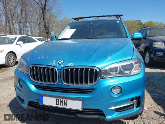 2015 BMW X5 sDrive35i z VIN 5UXKR2C55F0H35794, wystawiony jako IAAI lot #41898741 z przebiegiem 223 710 mil mil oraz . Historia ofert i sprzedaży dostępna na DreamBid. Obrazek 12.