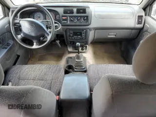 2000 Nissan Frontier XE with VIN 1N6ED27T8YC306716, listed as a Copart auction lot 55676965 with Not provided miles and Salvage title. Bid and sale history available at DreamBid. Image 8.