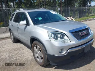 2010 GMC Acadia SLT1 z VIN 1GKLVMED1AJ139006, wystawiony jako IAAI lot #42232651 z przebiegiem 156 158 mil mil oraz . Historia ofert i sprzedaży dostępna na DreamBid. Obrazek 1.