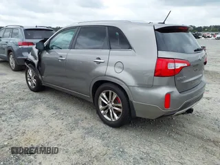 2014 Kia Sorento SX with VIN 5XYKWDA79EG440486, listed as a IAAI auction lot 41918486 with 167,288 mi miles and . Bid and sale history available at DreamBid. Image 3.
