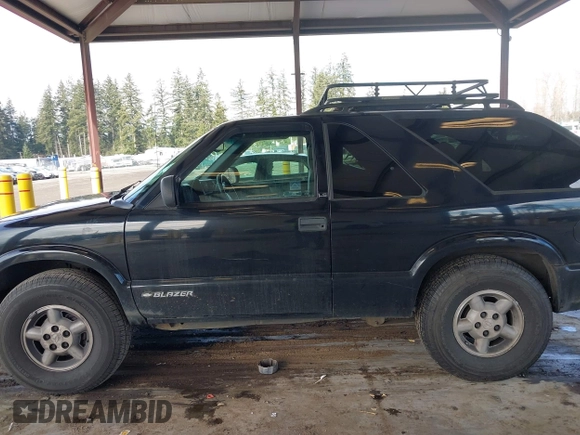 1999 Chevrolet Blazer LS with VIN 1GNCT18W3XK216840, listed as a IAAI auction lot 41534524 with 199,982 mi miles and . Bid and sale history available at DreamBid. Image 14.