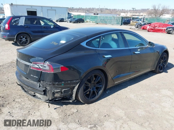 2020 Tesla Model S Long Range with VIN 5YJSA1E23LF381872, listed as a IAAI auction lot 41763046 with 96,720 mi miles and . Bid and sale history available at DreamBid. Image 4.