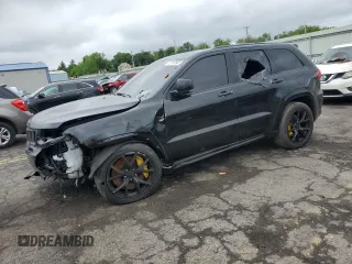 2018 Jeep Grand Cherokee Trackhawk with VIN 1C4RJFN92JC309855, listed as a Copart auction lot 57232905 with 34,232 mi miles and Salvage title. Bid and sale history available at DreamBid. Image 1.