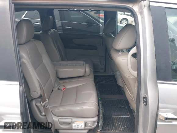 2012 Honda Odyssey EX-L with VIN 5FNRL5H66CB081323, listed as a IAAI auction lot 42465110 with 266,934 mi miles and . Bid and sale history available at DreamBid. Image 8.