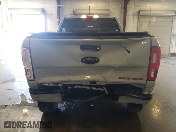 2021 Ford Ranger XL with VIN 1FTER4FH2MLD97098, listed as a Copart auction lot 56696975 with 21,565 mi miles and Salvage title. Bid and sale history available at DreamBid. Image 6.
