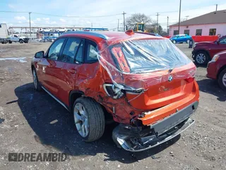 2015 BMW X1 xDrive28i with VIN WBAVL1C57FVY27822, listed as a IAAI auction lot 41977545 with 76,211 mi miles. Bid and sale history available at carsss.com. Image 17.