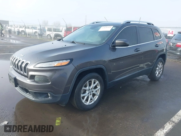 2017 Jeep Cherokee Latitude z VIN 1C4PJLCB7HW668185, wystawiony jako IAAI lot #41826925 z przebiegiem 172 790 mil mil oraz . Historia ofert i sprzedaży dostępna na DreamBid. Obrazek 2.