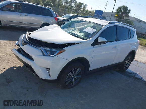 2018 Toyota RAV4 XLE with VIN JTMWFREV8JJ157496, listed as a IAAI auction lot 41816017 with 64,767 mi miles. Bid and sale history available at carsss.com. Image 2.