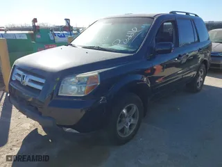 2007 Honda Pilot EX-L with VIN 5FNYF28557B003291, listed as a IAAI auction lot 41812795 with 191,493 mi miles. Bid and sale history available at carsss.com. Image 2.
