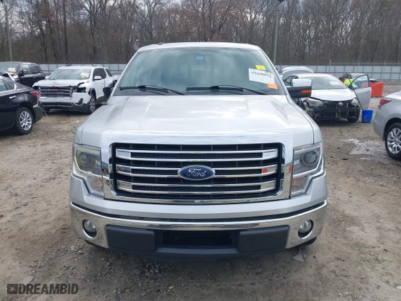 2013 Ford F-150 XL with VIN 1FTFW1CT1DFB14421, listed as a IAAI auction lot 41698573 with 243,033 mi miles. Bid and sale history available at carsss.com. Image 12.