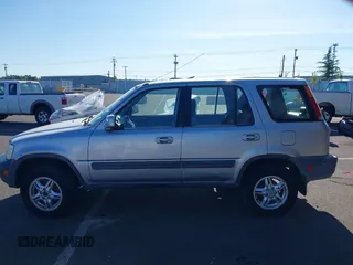 2001 Honda CR-V EX with VIN JHLRD18671C013132, listed as a IAAI auction lot 42057704 with 261,635 mi miles. Bid and sale history available at carsss.com. Image 13.