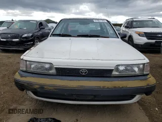 1991 Toyota Camry z VIN 4T1SV24E5MU355011, wystawiony jako Copart lot #51021185 z przebiegiem 135 881 mil mil oraz Czysty tytuł • Clean title. Historia ofert i sprzedaży dostępna na DreamBid. Obrazek 5.