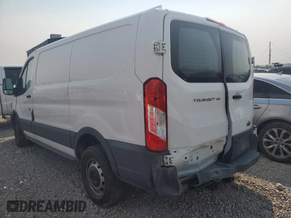 2016 Ford Transit Cargo with VIN 1FTYE1YM0GKA18854, listed as a Copart auction lot 71077954 with Not Provided miles and Salvage Title. Bid and sale history available at DreamBid. Image 2.