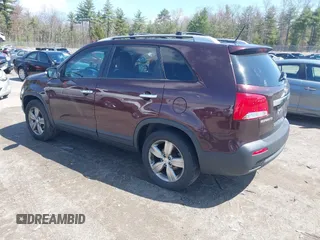 2012 Kia Sorento EX with VIN 5XYKU3A65CG299100, listed as a IAAI auction lot 42098445 with 172,203 mi miles. Bid and sale history available at carsss.com. Image 3.