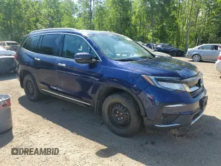 2020 Honda Pilot Touring 7-Passenger with VIN 5FNYF6H60LB501439, listed as a Copart auction lot 62011095 with Not provided miles and Salvage title. Bid and sale history available at DreamBid. Image 4.